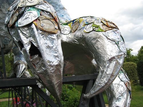 The claw of the dragon, showing the aluminum can scales.