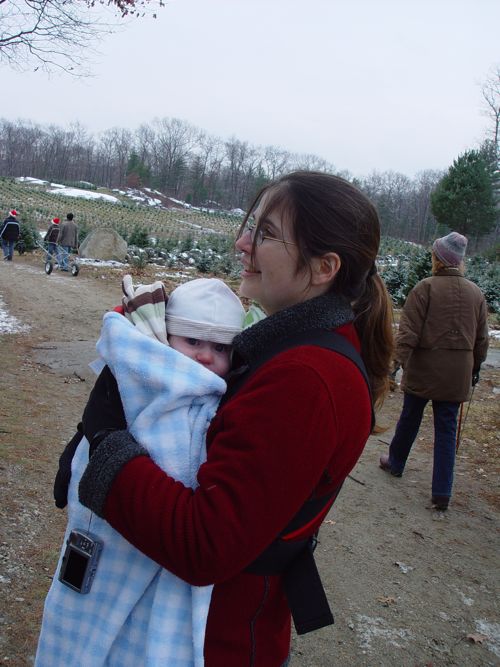 Me with Theo bundled in the bjorn and a blanket. (Photo taken by my mother.)