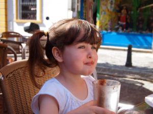 Phoebe enjoys the last drops of her hot chocolate.