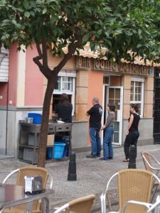 The window where we'd order and collect our breakfast. We did, however, need to be cautious as we walked from the cafe window to the tables, as you never knew when a moped might drive along the sidewalk in front of the cafe.